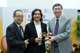 Mr. David Mong (left) and Professor Joseph Sung (right) present a souvenir to Professor Wu Wei Shan.